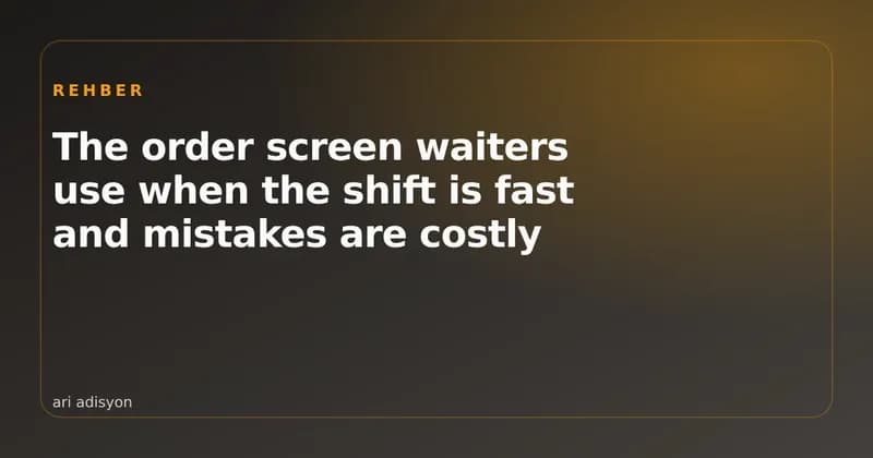 A waiter entering a table order on a handheld tablet